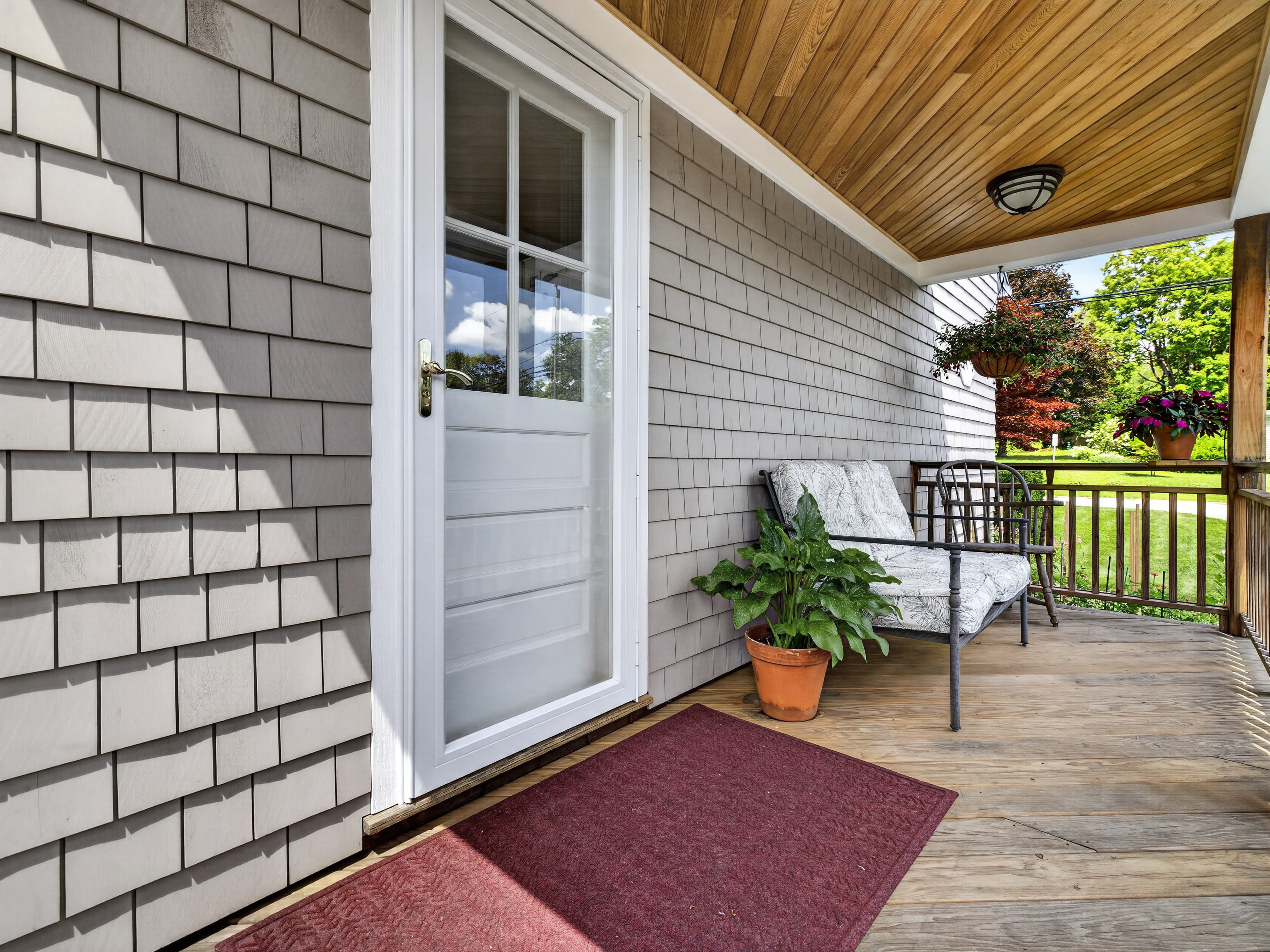 The covered porch at 16 Quaker Lane